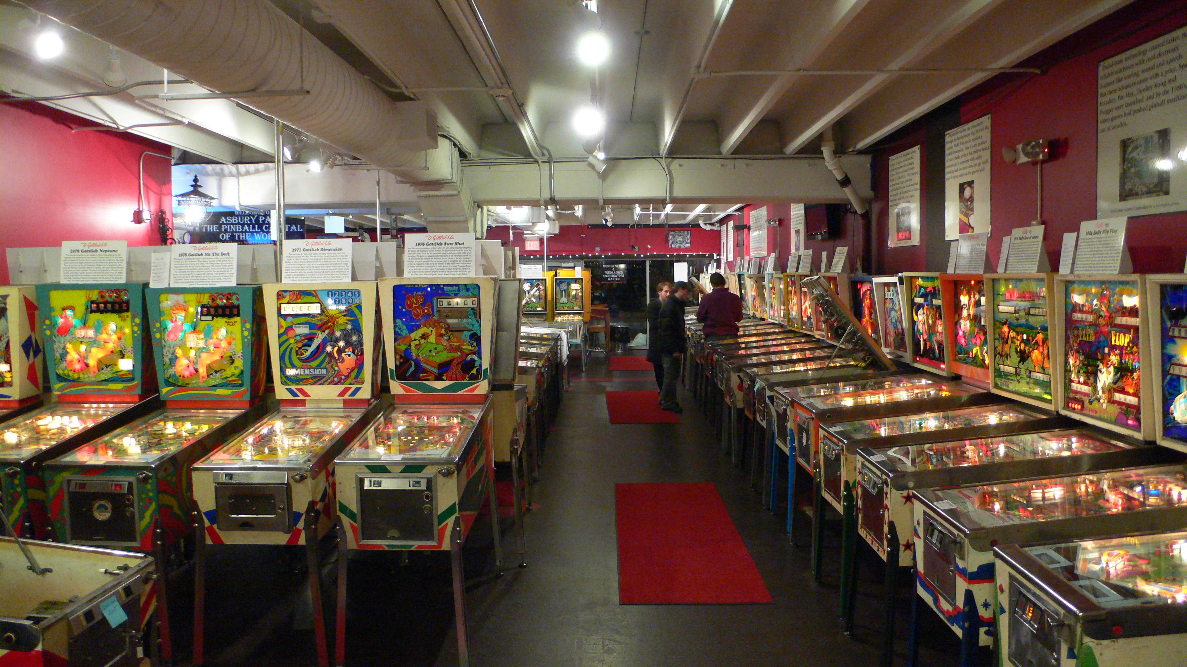 A long hall of vintage pinball machines at the Silverball Museum Arcade in Asbury Park.